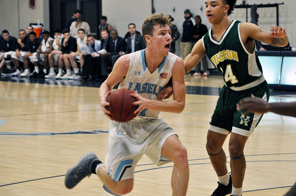 Lasell Men’s Basketball defeated by Husson