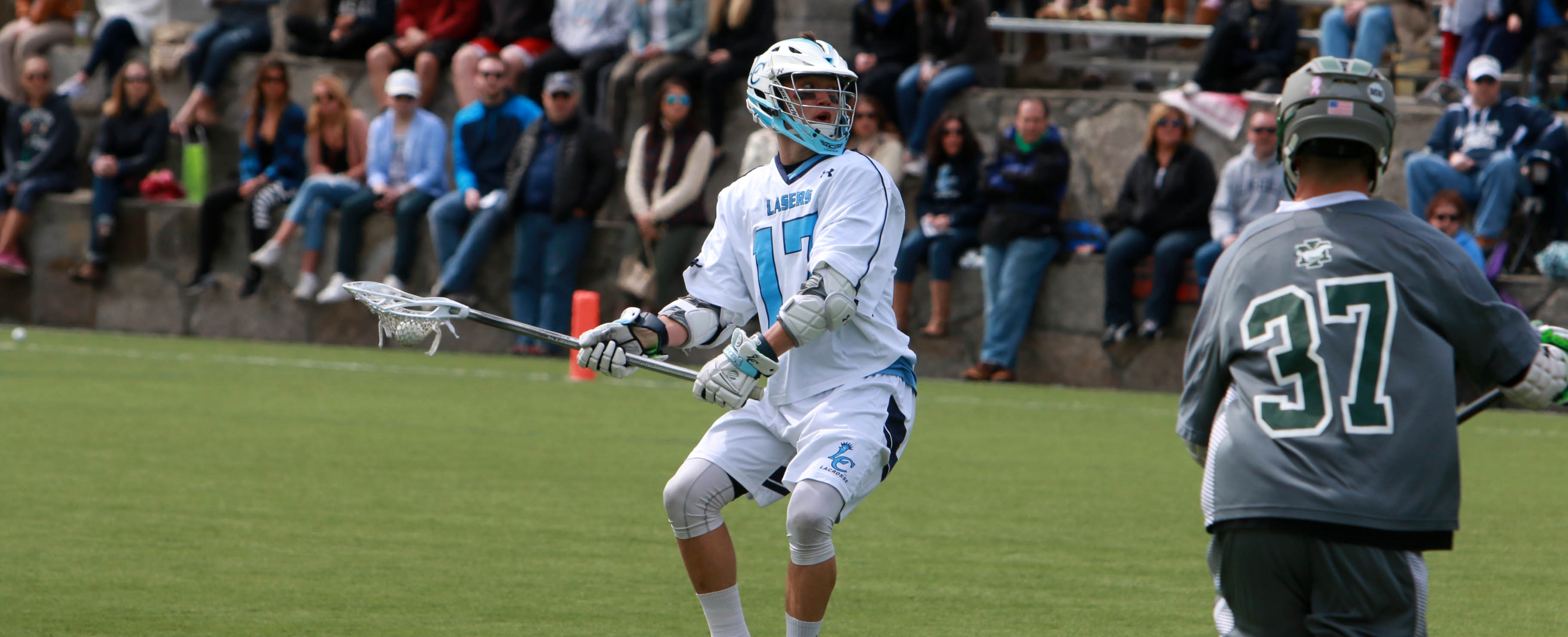 Lasers Contend with Roger Williams; Drop 13-12 Decision