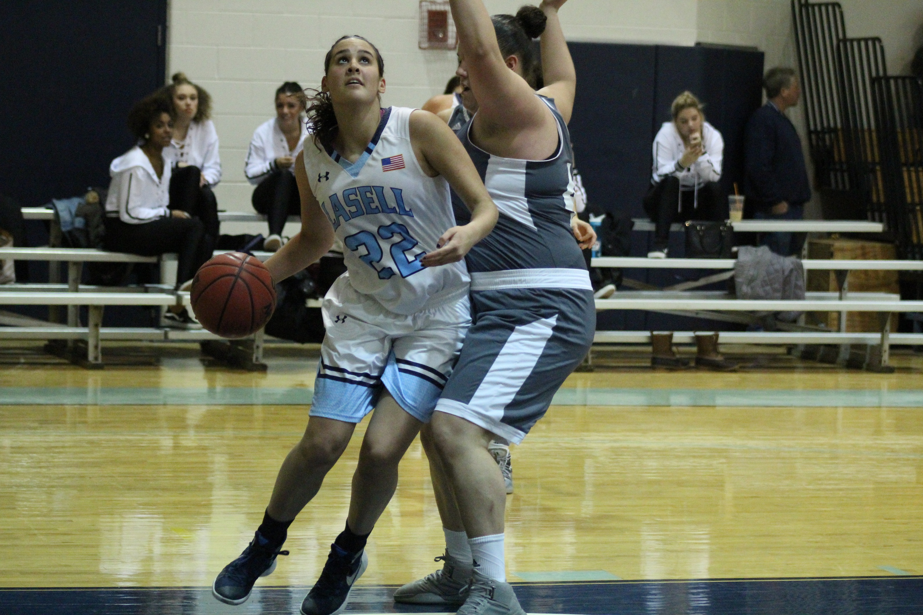 Lasers Fall to USJ 57-52 in GNAC Contest