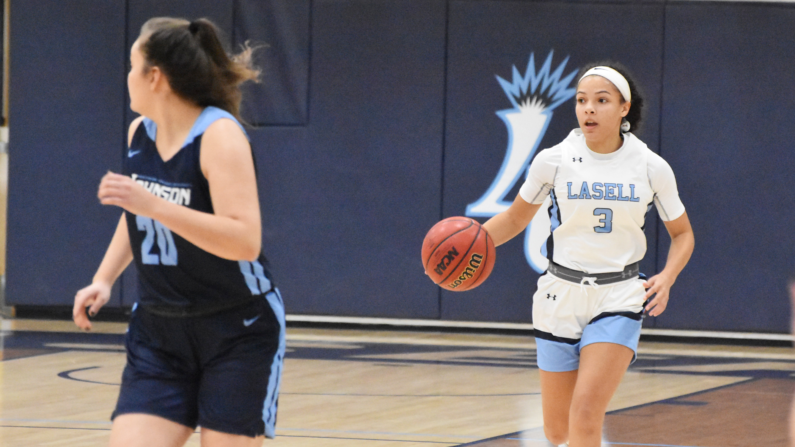 WBK: Carroll breaks single game point record in Lasell's first win