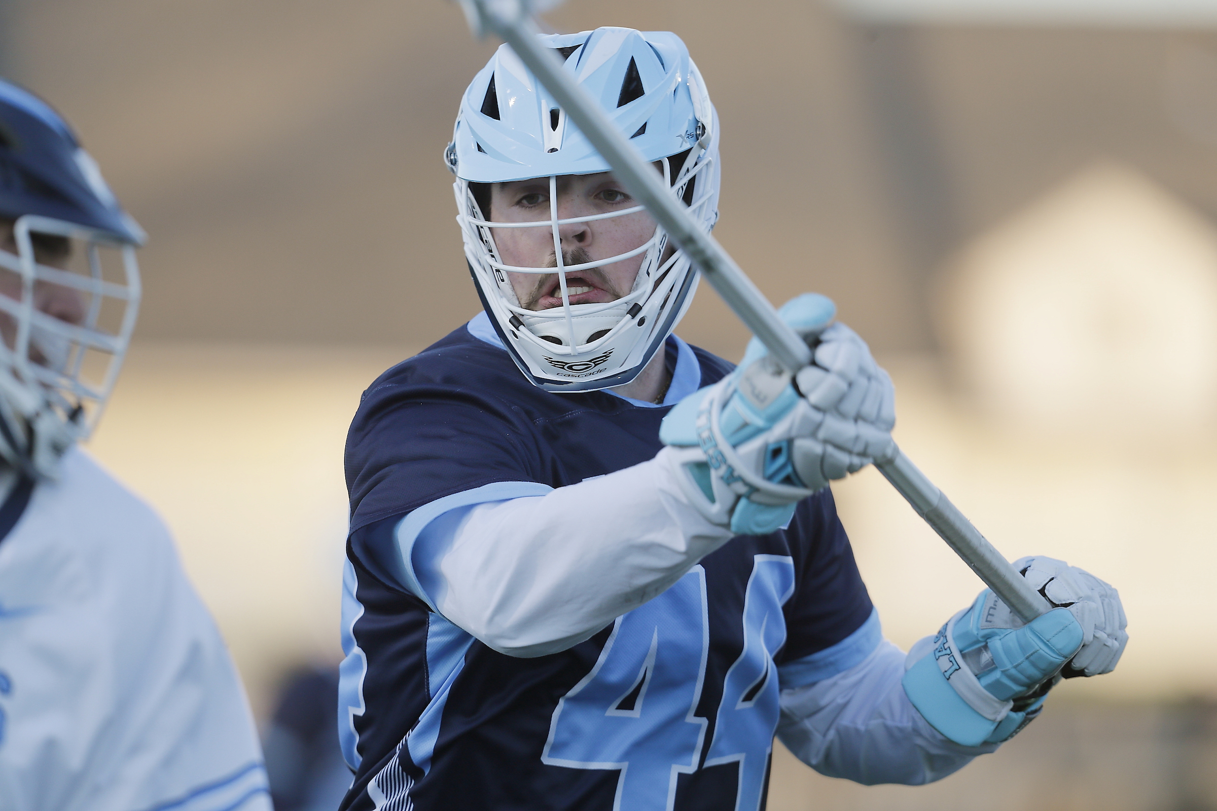 MLax: Lasers Drop Game to SUNY Cortland